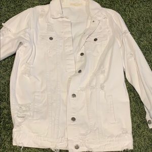 Oversized white distressed denim jacket
